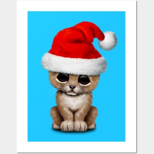 Cute Lion Cub Wearing a Santa Hat Posters and Art